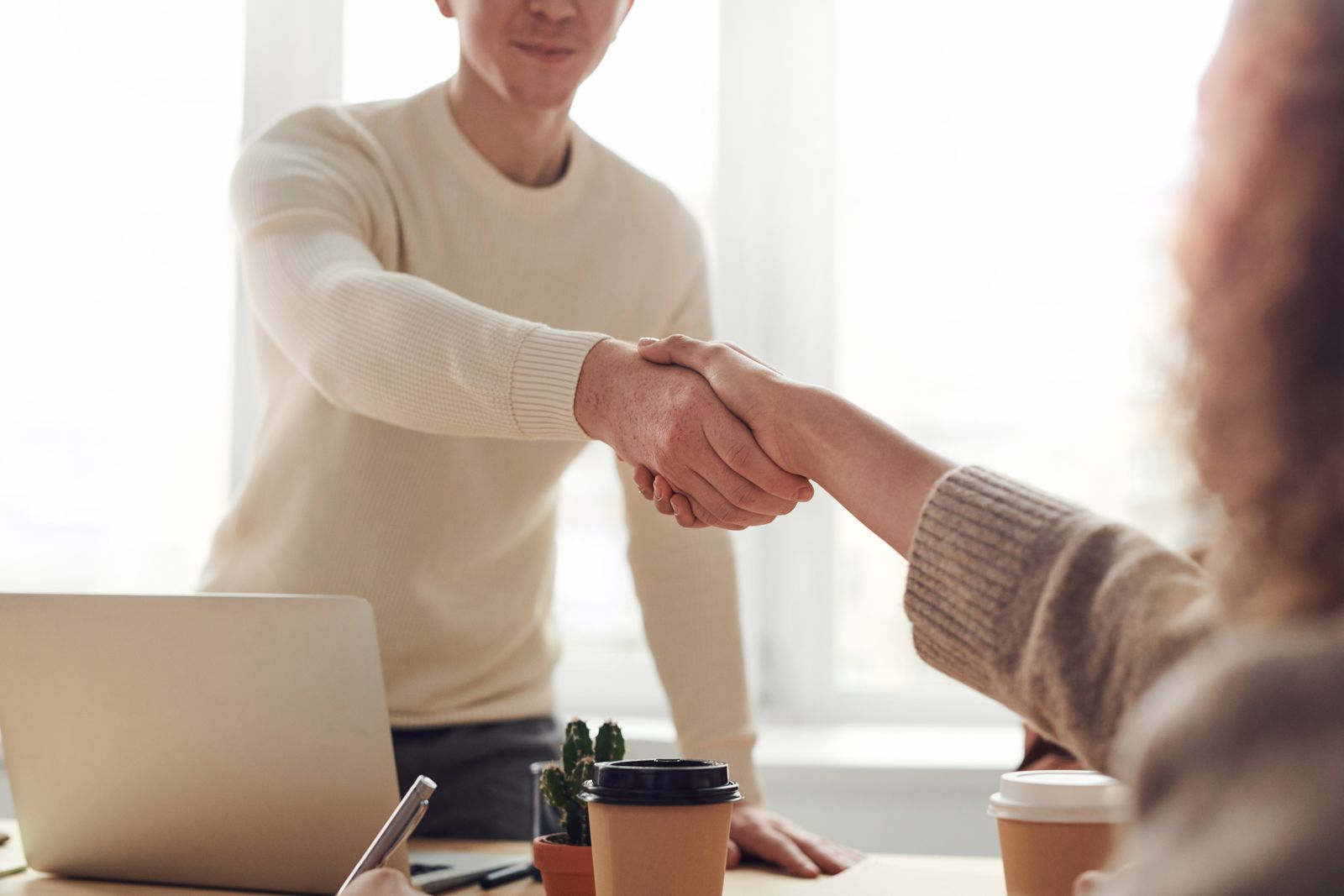 A professional client meeting centered on clear communication